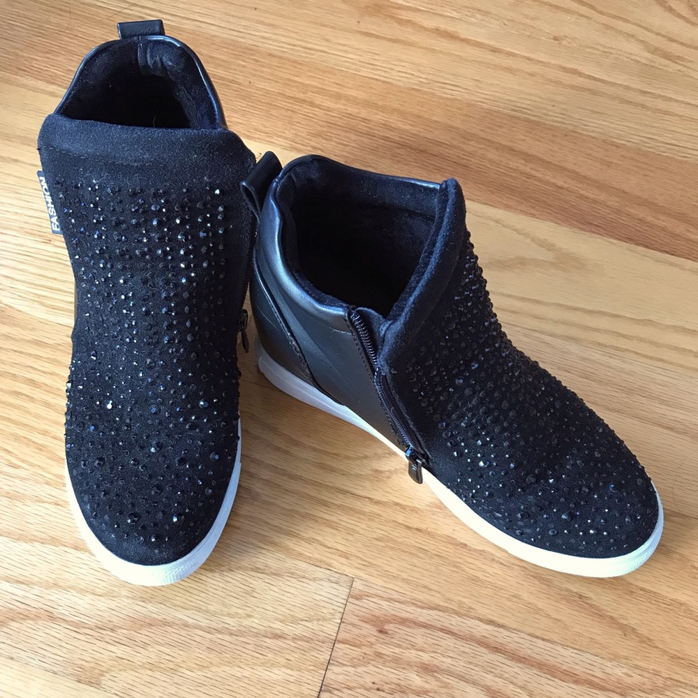 Black Sequins heeled Sneakers. Gently used a few times.